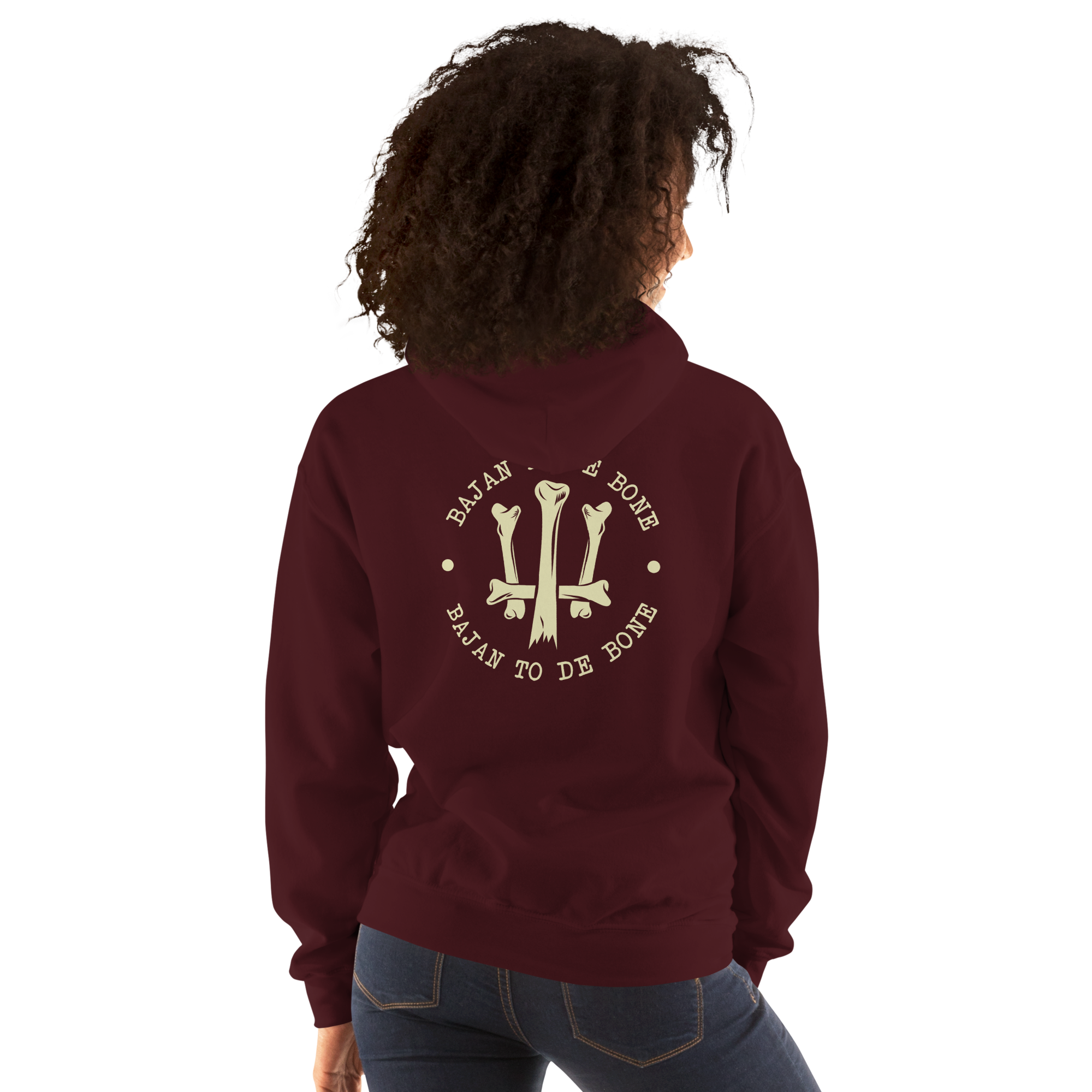 Person wearing a maroon hoodie with a barbados trident design on the back, standing against a white background